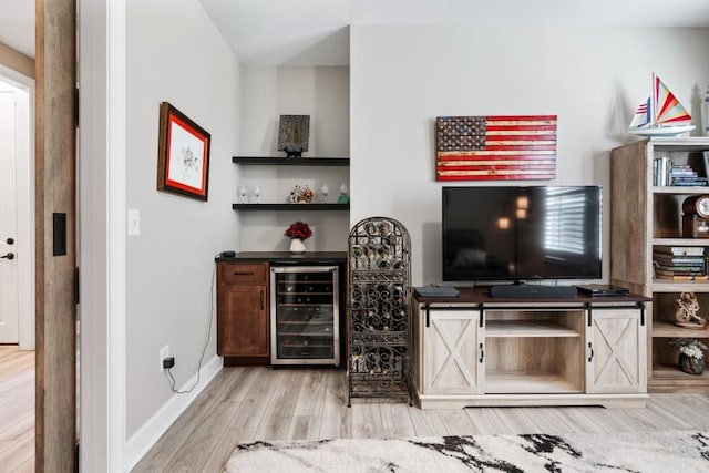 310 Chatuge Dr, Hoschton, GA 30548 - bar area with beverage cooler, wood finished floors, and baseboards