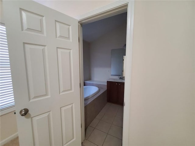4215 Wildener Way, Cumming, GA 30041 - bathroom with a garden tub, vanity, and tile patterned flooring