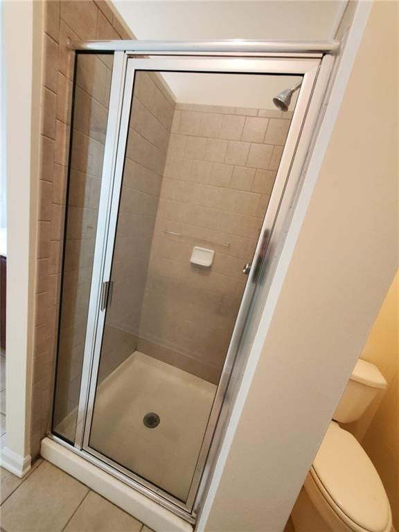 4215 Wildener Way, Cumming, GA 30041 - full bathroom featuring toilet, a shower stall, and tile patterned flooring