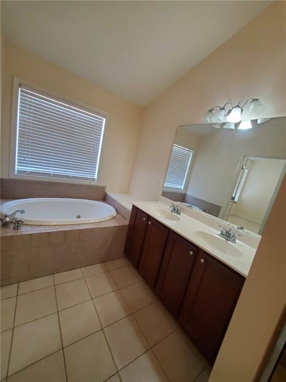 4215 Wildener Way, Cumming, GA 30041 - bathroom with lofted ceiling, double vanity, a bath, tile patterned floors, and a sink