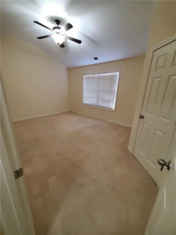 4215 Wildener Way, Cumming, GA 30041 - spare room with a ceiling fan, baseboards, visible vents, and light carpet