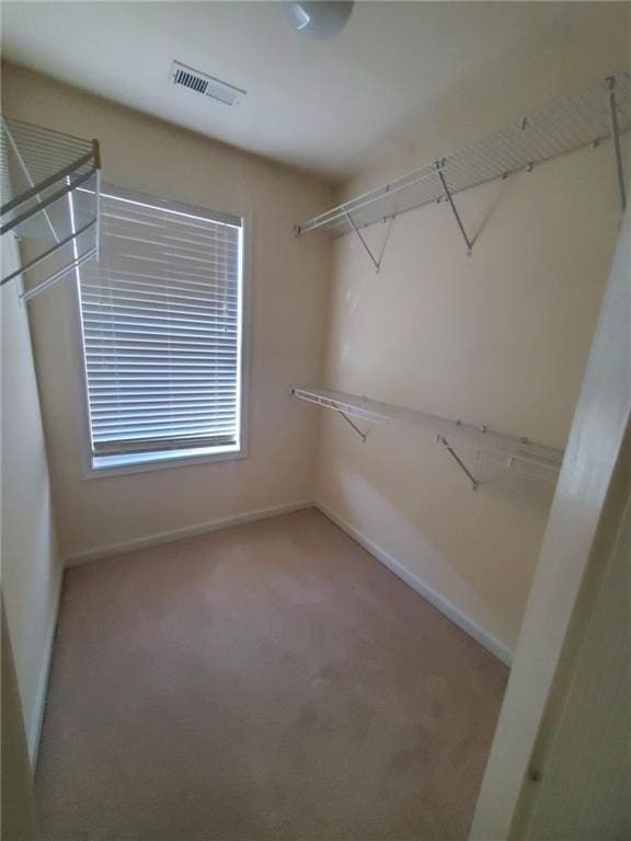 4215 Wildener Way, Cumming, GA 30041 - walk in closet with visible vents and carpet flooring