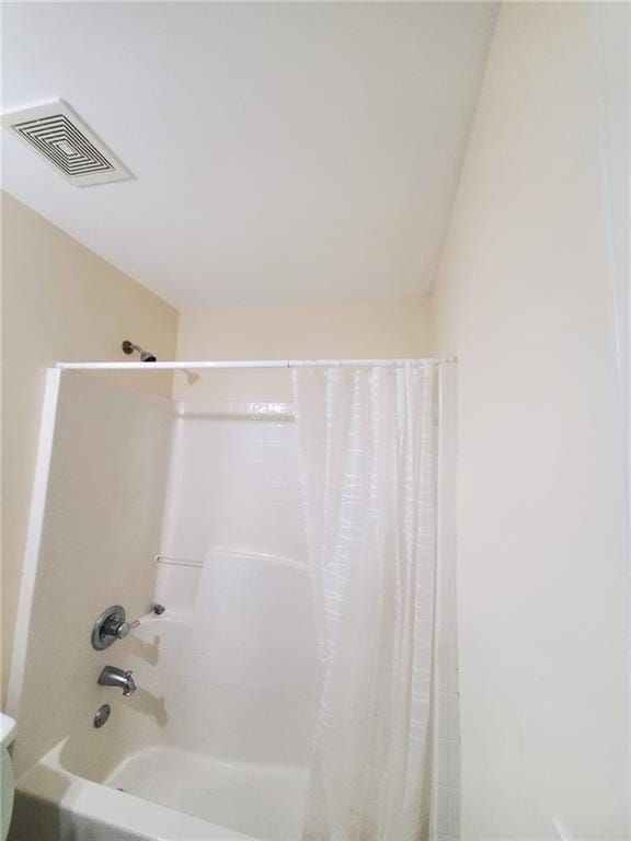 4215 Wildener Way, Cumming, GA 30041 - full bathroom featuring visible vents, toilet, and shower / bath combo with shower curtain
