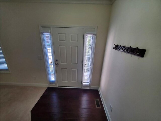 4215 Wildener Way, Cumming, GA 30041 - foyer with visible vents, baseboards, and dark wood-type flooring