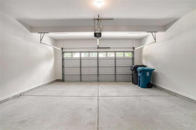 garage featuring a garage door opener