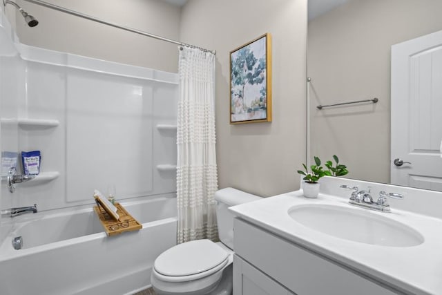 full bath featuring vanity, shower / bath combination with curtain, and toilet