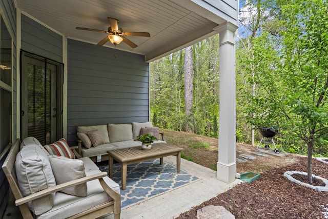 view of patio with an outdoor living space and ceiling fan