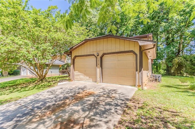 garage featuring driveway
