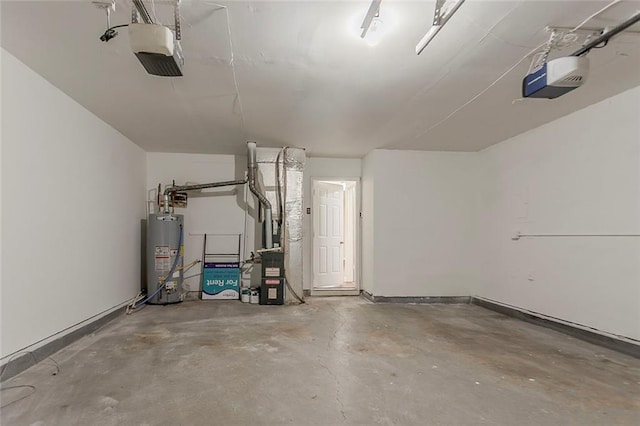 garage featuring gas water heater and a garage door opener