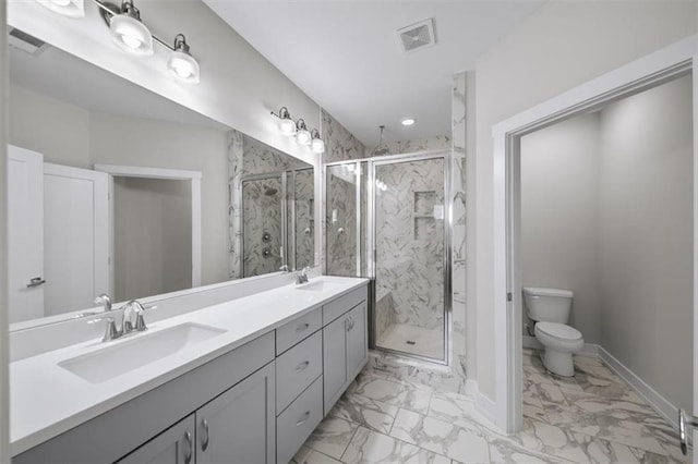 full bathroom with baseboards, a marble finish shower, a sink, toilet, and marble finish floor