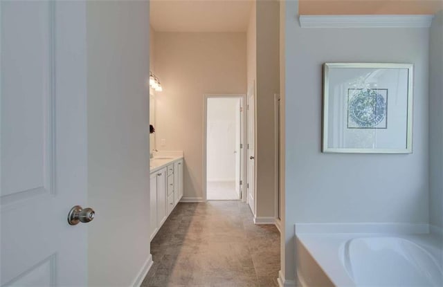 full bath featuring a bath and vanity