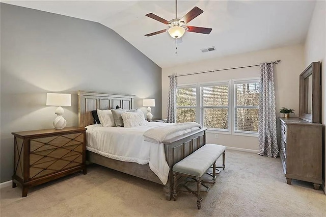 bedroom with visible vents, ceiling fan, baseboards, light colored carpet, and vaulted ceiling