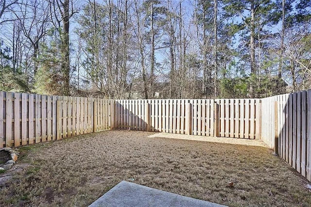 view of yard featuring a fenced backyard