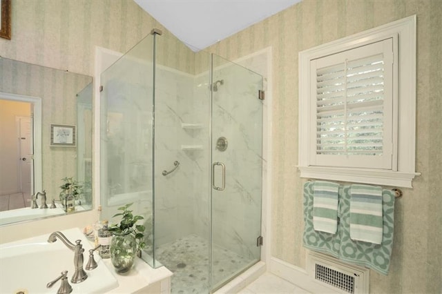 416 Mcdaniel St, Monroe, GA 30655 - full bath featuring wallpapered walls, a marble finish shower, a whirlpool tub, and a sink