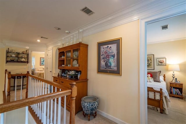 416 Mcdaniel St, Monroe, GA 30655 - hall with an upstairs landing, light colored carpet, crown molding, a baseboard radiator, and baseboards