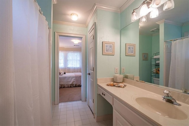 416 Mcdaniel St, Monroe, GA 30655 - ensuite bathroom with tile patterned floors, vanity, crown molding, and curtained shower