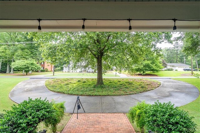 416 Mcdaniel St, Monroe, GA 30655 - surrounding community featuring a lawn