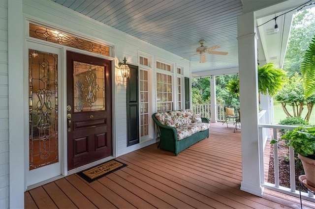 416 Mcdaniel St, Monroe, GA 30655 - wooden porch with a ceiling fan