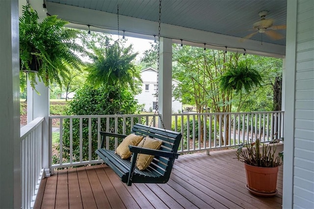 416 Mcdaniel St, Monroe, GA 30655 - wooden porch featuring a ceiling fan