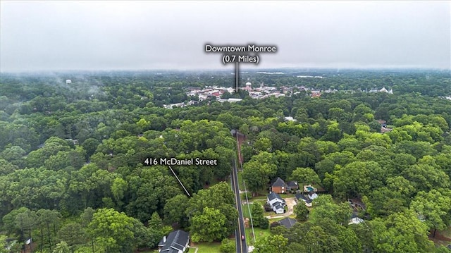 416 Mcdaniel St, Monroe, GA 30655 - view of property location with property parcel outlined and a forest