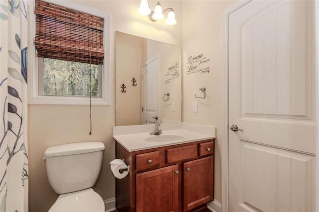 bathroom with vanity and toilet