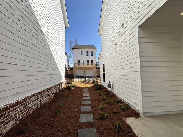 view of property exterior featuring fence