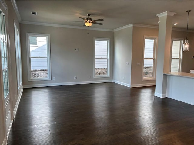 unfurnished living room with healthy amount of natural light, ceiling fan, baseboards, and crown molding