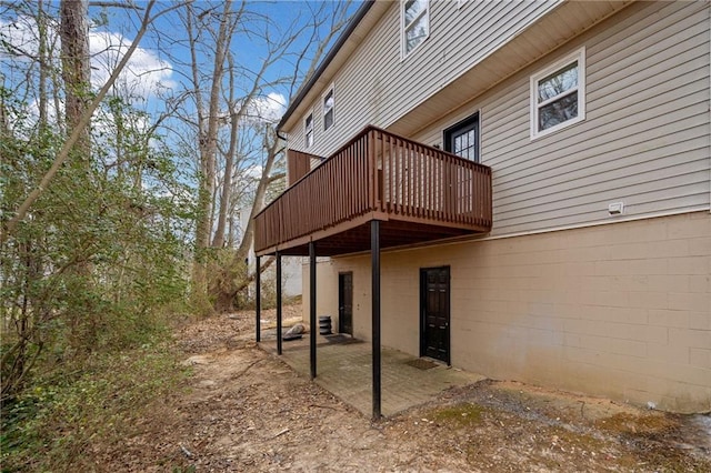 exterior space featuring a wooden deck