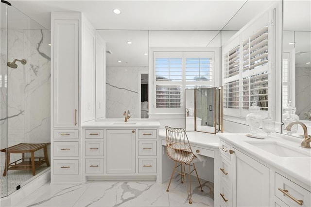 bathroom with marble finish flooring, a marble finish shower, two vanities, and recessed lighting