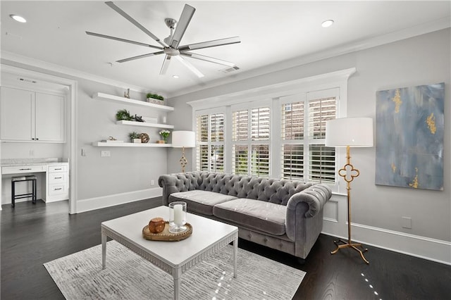 living room with dark wood finished floors, ceiling fan, baseboards, recessed lighting, and crown molding