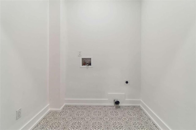 laundry area with hookup for a washing machine, hookup for an electric dryer, baseboards, and light tile patterned flooring