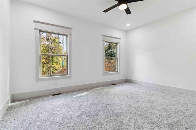 carpeted empty room with recessed lighting, ceiling fan, and baseboards