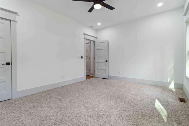 spare room featuring visible vents, baseboards, ceiling fan, carpet flooring, and recessed lighting