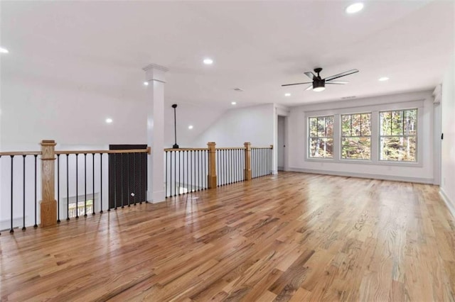 spare room featuring light wood-type flooring, ceiling fan, baseboards, and recessed lighting