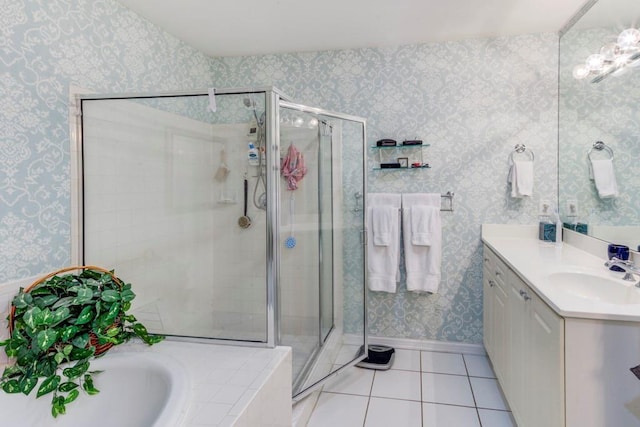 bathroom featuring separate shower and tub, tile patterned flooring, and vanity