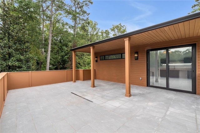 view of patio with fence