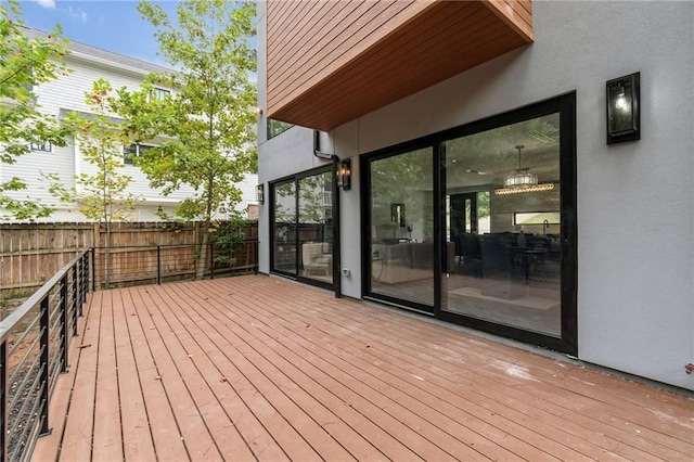 wooden deck featuring fence