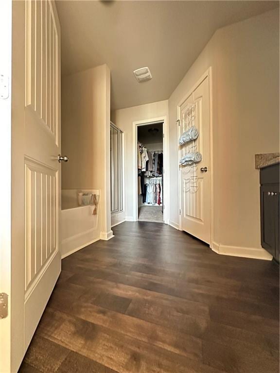 302 Turtle Creek Dr, Winder, GA 30680 - corridor featuring dark wood-type flooring and baseboards