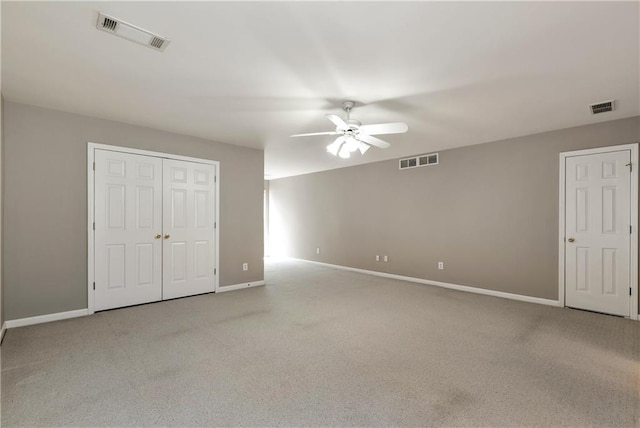 3885 Lake Juliette Dr, Buford, GA 30519 - unfurnished bedroom featuring baseboards, light colored carpet, ceiling fan, and a closet