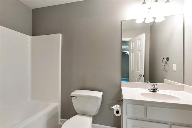 3885 Lake Juliette Dr, Buford, GA 30519 - full bathroom with toilet, vanity, baseboards,  shower combination, and a chandelier