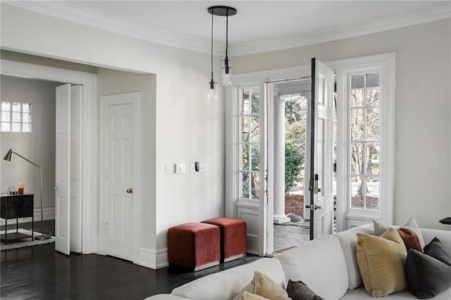 living room featuring crown molding, ceiling fan with notable chandelier, and dark hardwood / wood-style flooring