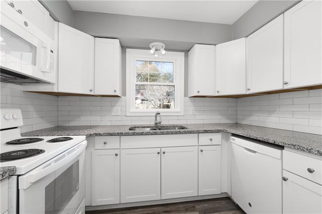 80 Montre Sq NW, Atlanta, GA 30327 - kitchen featuring white appliances, a sink, white cabinetry, backsplash, and light stone counters