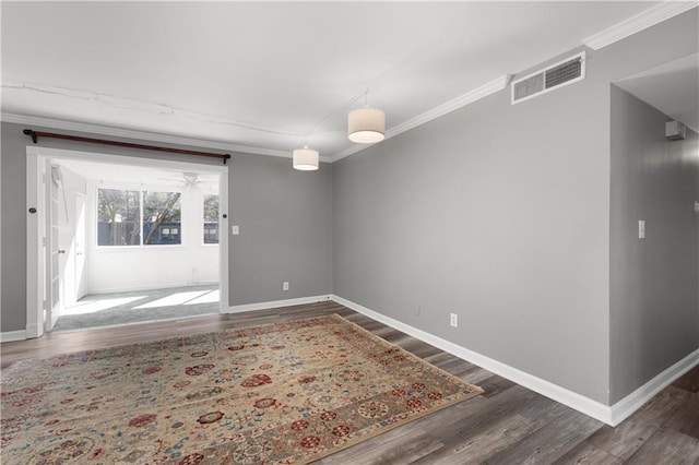80 Montre Sq NW, Atlanta, GA 30327 - unfurnished room featuring wood finished floors, crown molding, and baseboards