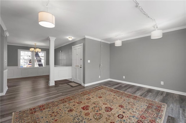 80 Montre Sq NW, Atlanta, GA 30327 - unfurnished room with a chandelier, wood finished floors, ornamental molding, decorative columns, and track lighting