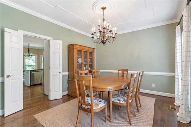 5396 Turnbill Pt NW, Acworth, GA 30101 - dining room featuring a chandelier, dark wood-style floors, and ornamental molding