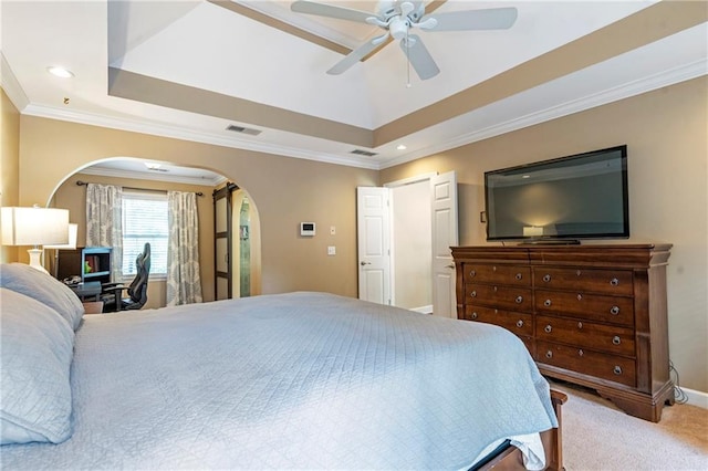 5396 Turnbill Pt NW, Acworth, GA 30101 - carpeted bedroom with arched walkways, ornamental molding, a raised ceiling, a ceiling fan, and recessed lighting