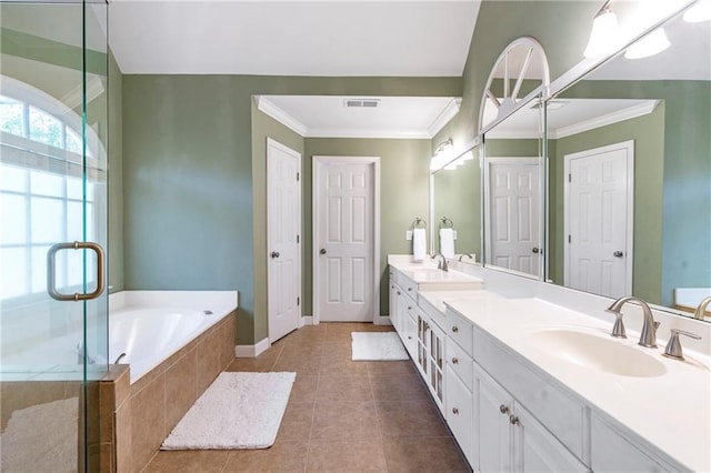 5396 Turnbill Pt NW, Acworth, GA 30101 - full bathroom featuring double vanity, a garden tub, a stall shower, crown molding, and tile patterned floors