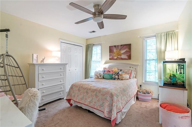 5396 Turnbill Pt NW, Acworth, GA 30101 - carpeted bedroom featuring multiple windows, a closet, and a ceiling fan