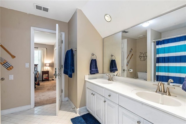 5396 Turnbill Pt NW, Acworth, GA 30101 - ensuite bathroom featuring double vanity and tile patterned flooring