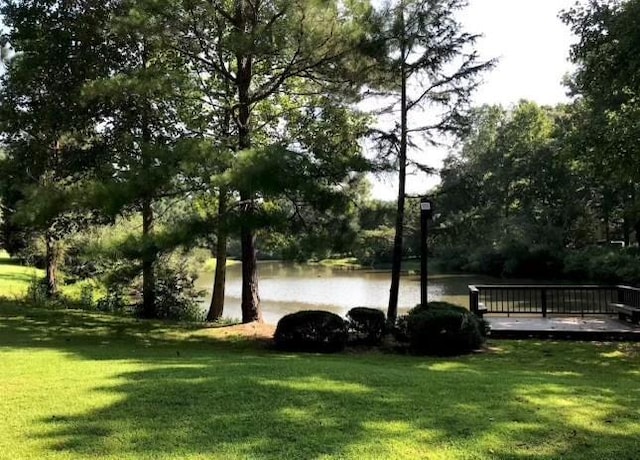 5396 Turnbill Pt NW, Acworth, GA 30101 - view of property's community with a yard and a deck with water view